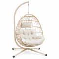 Fauteuil suspendu 105 x 105 x 195 cm en métal et rotin beige avec support sur pied